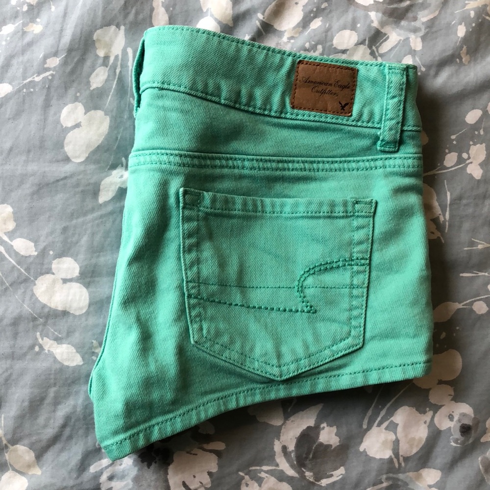 Green denim stretch shorts
